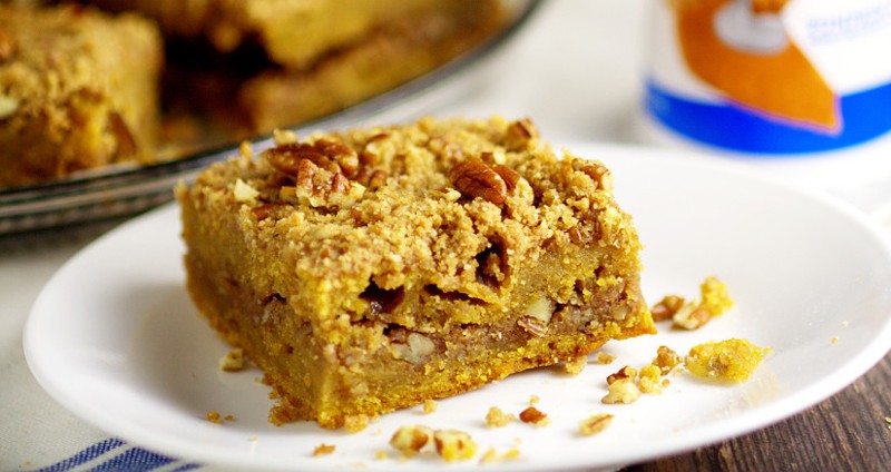 Rich and moist Pumpkin Cinnamon Coffee Cake recipe made with pumpkin pie yogurt, pumpkin, and a crunchy cinnamon-pecan streusel for an amazing Fall breakfast recipe. Also freezer friendly! OMG. Pumpkin spice for breakfast?!