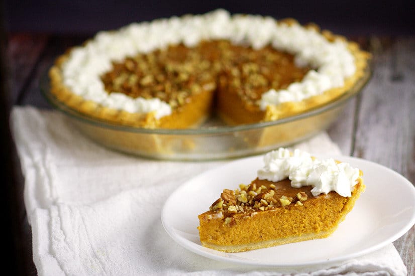 Sweet flavors of maple and pumpkin combine with spicy cinnamon and pumpkin spice in this Maple Pumpkin Pie for an unforgettable holiday dessert! Omg. Pumpkin and maple sound so fabulous together. Perfect Fall dessert and would be a super yummy Thanksgiving dessert recipe too!