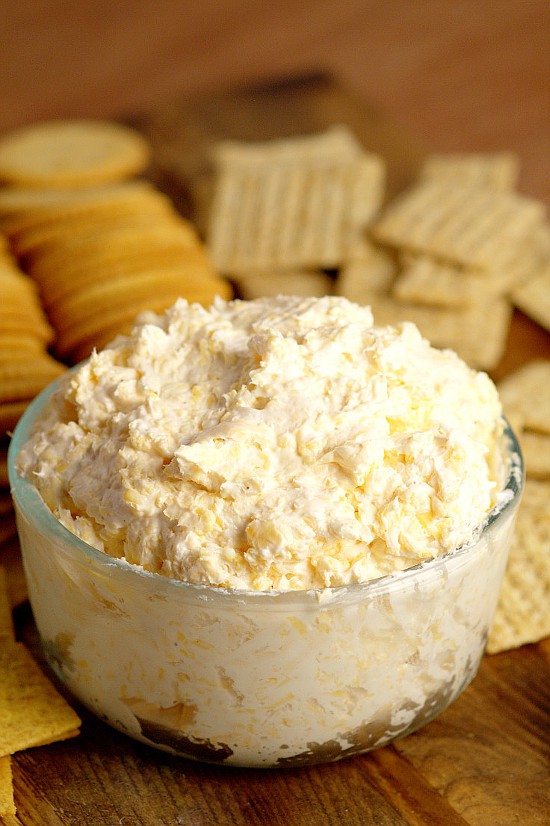 Ranch Cheddar Beer Dip - Perfect for a party and football games, this Ranch Cheddar Beer Dip has creamy ranch and cream cheese mixed with the bite of sharp cheddar and bitter beer to make an outstanding drool-worthy dip recipe! Super easy dip recipe and appetizer recipe, and super yummy too!