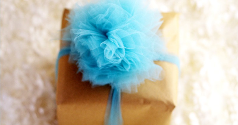 Learn how to make a beautiful and totally easy DIY Tulle Gift Bow with this easy Diy crafts tutorial to add a pretty finishing touch to all of your gifts. Perfect for Christmas gifts, birthday gifts, baby shower gifts, wedding shower gifts, and MORE! This is so pretty! Can't wait to try it!