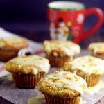 Eggnog Muffins recipe with real eggnog to give them a rich, moist texture and flavor with a crunchy streusel topping and a to-die-for eggnog glaze. Perfect recipe for a Christmas morning breakfast!