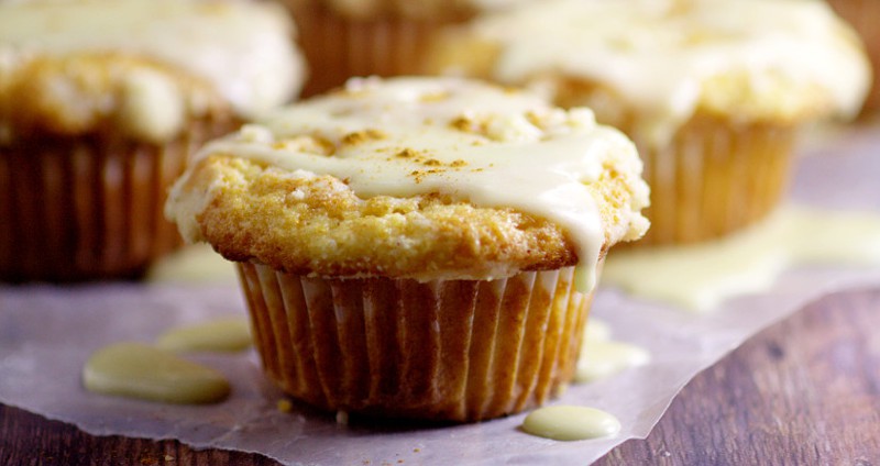 Eggnog Muffins recipe with real eggnog to give them a rich, moist texture and flavor with a crunchy streusel topping and a to-die-for eggnog glaze. Perfect recipe for a Christmas morning breakfast!