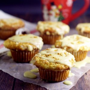 Eggnog Muffins recipe with real eggnog to give them a rich, moist texture and flavor with a crunchy streusel topping and a to-die-for eggnog glaze. Perfect recipe for a Christmas morning breakfast!