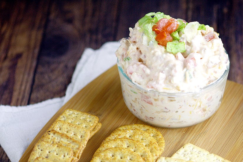 Easy BLT Dip recipe. Salty, crispy bacon and zesty tomatoes in a creamy dip make this BLT Dip recipe amazing.  Perfect easy appetizer or dip recipe to serve at your next gathering! Mmmm.. This would be delicious football food! Bacon!