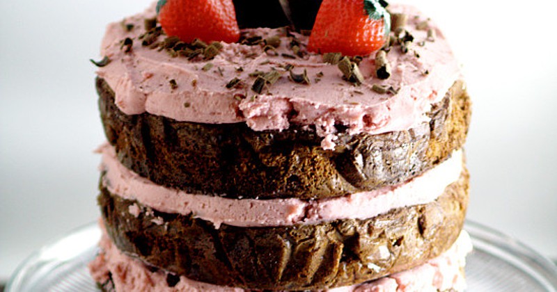 Decadent Dark Chocolate Cake recipe with Strawberry Buttercream is an indulgent chocolate treat.  Sweet strawberry buttercream, sandwiched between layers or rich dark chocolate cake.   Mmmmm... Chocolate and strawberries would be a yummy treat for Valentine's Day too!
