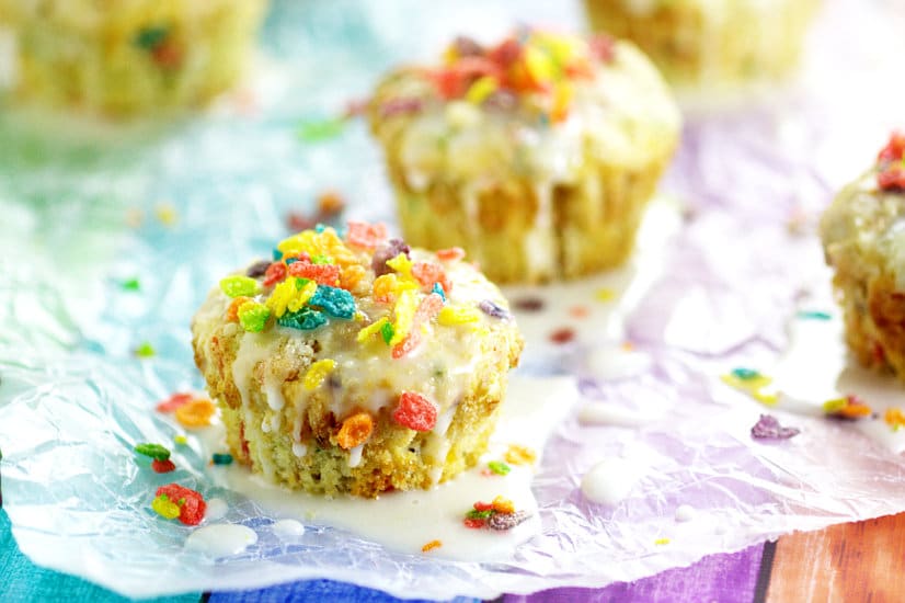 Rainbow Fruity Pebbles Muffins are a pretty fun breakfast idea perfect for St Patrick's Day. Fun and easy to make these Rainbow Fruity Pebbles Muffins with a crunchy streusel topping and sweet, simple glaze will make you feel like you've hit the breakfast jackpot!