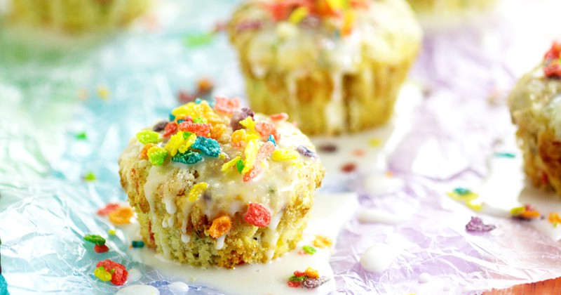 Rainbow Fruity Pebbles Muffins are a pretty fun breakfast idea perfect for St Patrick's Day. Fun and easy to make these Rainbow Fruity Pebbles Muffins with a crunchy streusel topping and sweet, simple glaze will make you feel like you've hit the breakfast jackpot!