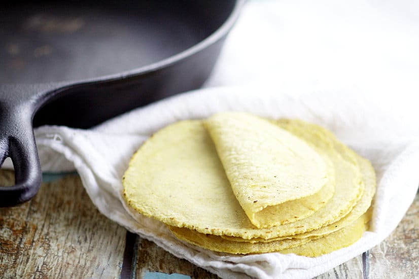Soft, fresh Homemade Corn Tortillas are easy to make with just 2 ingredients and makes taco night even more delicious. A recipe that all home cooks should know!