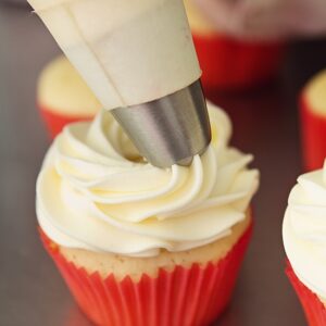 Pipeable Cream Cheese Frosting Recipe. The perfect Pipeable Cream Cheese Frosting for piping beautiful swirls onto cakes and cupcakes that's versatile and yummy enough for all of your favorite treats! Easy to make too!