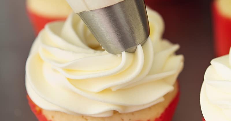Pipeable Cream Cheese Frosting Recipe. The perfect Pipeable Cream Cheese Frosting for piping beautiful swirls onto cakes and cupcakes that's versatile and yummy enough for all of your favorite treats! Easy to make too!