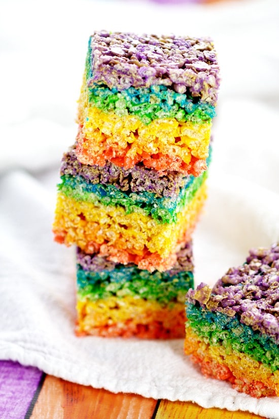 Rainbow Rice Krispie Treats recipe. Easy, no bake Rainbow Rice Krispie Treats make a pretty and festive treat for St Patrick's Day, or even just for fun, that everyone will love! What an adorable dessert recipe for St Patrick's Day or even a rainbow birthday party!