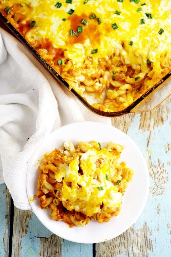 Frugal and freezer-friendly, this Cheesy Kielbasa Pasta Bake recipe is perfect for family dinner with kielbasa, pasta, and added veggies for extra nutrition and flavor, covered in red sauce for a full delicious meal.