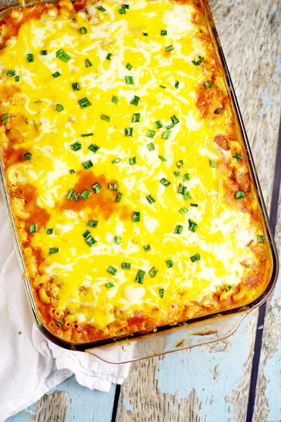 Frugal and freezer-friendly, this Cheesy Kielbasa Pasta Bake recipe is perfect for family dinner with kielbasa, pasta, and added veggies for extra nutrition and flavor, covered in red sauce for a full delicious meal.
