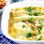 Creamy Shrimp Enchiladas - Creamy and rich with added pops of flavor from onions and peppers, these Creamy Shrimp Enchiladas are easy enough for family dinner and elegant enough for a date night in. These look fabulous!