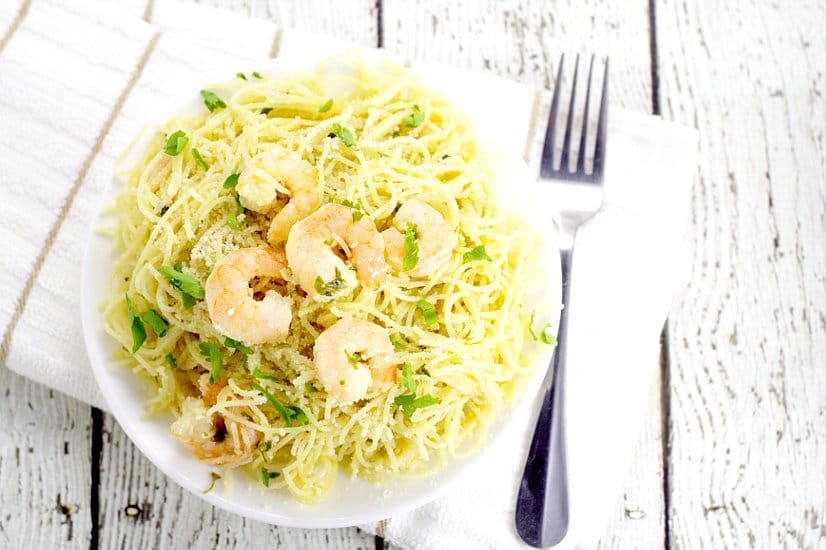 Garlic Parmesan Shrimp and Angel Hair pasta makes a delicious family meal.  Juicy shrimp with garlic, butter, and Parmesan cheese adorn a hearty helping of angel hair pasta in this 30 minute Garlic Parmesan Shrimp and Angel Hair dinner recipe. 