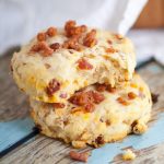 Bacon and Sun Dried Tomato Biscuits make a delicious and easy side dish recipe.  Even better than a traditional biscuits, these Bacon and Sun Dried Tomato Biscuits are flaky and golden with pops of zesty flavor from sun-dried tomatoes and bacon.