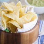 Homemade Corn Tortilla Chips are easy to make! A simple recipe to make your own Homemade Corn Tortilla Chips that are absolutely delicious.  Store bought tortilla chips just can't compete with these crunchy fresh ones!