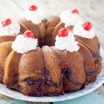 Cherry Marble Cake Recipe - Simple and quick prep, this pretty and sweet Cherry Marble Cake recipe tastes like pound cake with a fresh swirl of tangy cherries. Top with whipped cream & cherry.