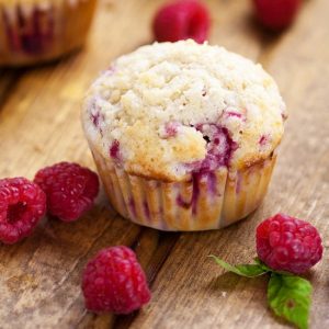 Raspberry Streusel Muffins Recipe - Sweet but tart, these fresh Raspberry Streusel Muffins topped with a heavenly, crunchy streusel will make breakfast a decadent treat.  Easy breakfast recipe that's also freezer friendly. Fabulous!