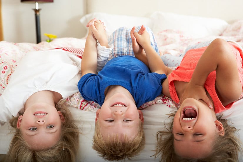 Tips for getting sleep and staying rested while on vacation with kids for a fabulous family vacation. Use these 8 Tips for Making Sure the Whole Family Sleeps Well on Vacation to keep the whole family happy, rested, and having fun for your vacation this year!