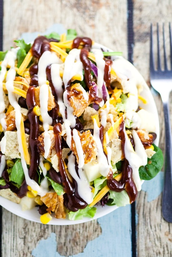 Barbecue Ranch Chicken Salad Recipe - Quick and easy Barbecue Ranch Chicken Salad with crisp green lettuce, corn, black beans, and grilled barbecue chicken makes a perfect, fresh salad for lunch or dinner. Perfect for using up leftovers!