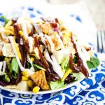 Barbecue Ranch Chicken Salad Recipe - Quick and easy Barbecue Ranch Chicken Salad with crisp green lettuce, corn, black beans, and grilled barbecue chicken makes a perfect, fresh salad for lunch or dinner. Perfect for using up leftovers!