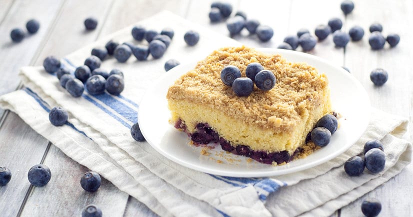 Classic Blueberry Buckle Recipe - Sweet and tangy combine to make this Classic Blueberry Buckle cake recipe truly amazing, with moist cake, fresh blueberries and a crumbly, crunchy streusel topping.  Easy dessert recipe to make and tastes AMAZING with fresh Summer blueberries.