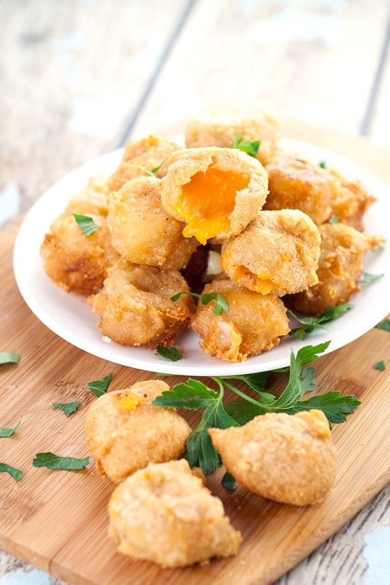 Deep Fried Cheese Bites recipe - Crispy, cheesy Deep Fried Cheese Bites in a flavorful beer batter make a perfect snack, appetizer, or even a side to your favorite burger. A cheese lover's dream! Love this for an easy appetizer recipe. 