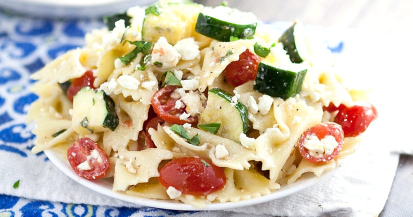Fresh Zucchini Farfalle Pasta Salad recipe - Quick and easy Fresh Zucchini Farfalle Pasta Salad recipe is a simple pasta salad with bowtie pasta, creamy feta and tomatoes and is sure to be a hit at every cookout and potluck. Great for a crowd! This looks so fresh and tasty!