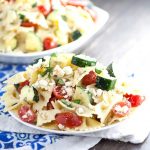 Fresh Zucchini Farfalle Pasta Salad recipe - Quick and easy Fresh Zucchini Farfalle Pasta Salad recipe is a simple pasta salad with bowtie pasta, creamy feta and tomatoes and is sure to be a hit at every cookout and potluck. Great for a crowd! This looks so fresh and tasty!