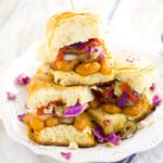 Sriracha Ranch Popcorn Shrimp Sliders recipe - a quick and easy dinner recipe and a classic-gone-coastal, these zesty Sriracha Ranch Popcorn Shrimp Sliders topped with cheese and a cool, crisp fresh slaw are a perfect quick and easy Summer dinner recipe. 