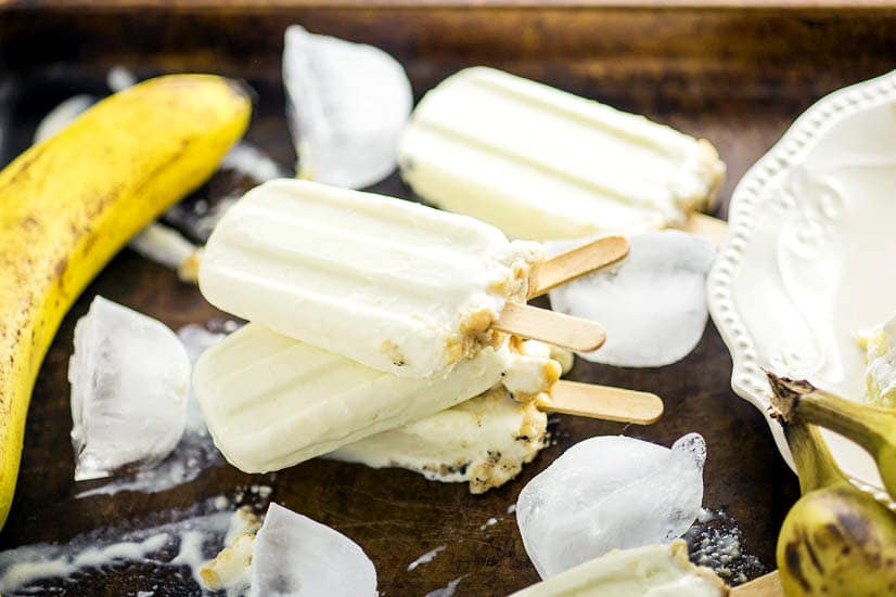 Banana Cream Pie Popsicles Recipe - Taking Banana Cream Pie to the next level, these Banana Cream Pie Popsicles will keep you cool and satisfied on a hot summer day. Just 4 ingredients to make this quick and easy popsicle recipe!