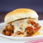 Pizza Sloppy Joes Recipe - Quick and easy Pizza Sloppy Joes recipe is saucy and cheesy with everything you love about pizza and can be made in just 30 minutes for a simple quick and easy family dinner recipe!  Look at that cheese! Yum!