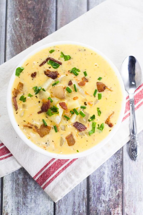 Cheesy Potato Soup Recipe - Warm and creamy Cheesy Potato Soup recipe is a deliciously perfect classic comfort food recipe to keep you warm and happy all winter long. Yummmm! One of my all time favorite delicious soup recipes. Ever. 