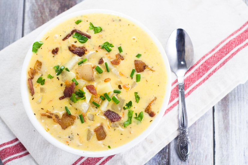 Cheesy Potato Soup Recipe - Warm and creamy Cheesy Potato Soup recipe is a deliciously perfect classic comfort food recipe to keep you warm and happy all winter long. Yummmm! One of my all time favorite delicious soup recipes. Ever. 