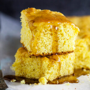 Maple Cornbread Recipe - A sweet, maple twist on a classic favorite, this homemade Maple Cornbread recipe is made from scratch and takes traditional cornbread to a whole new delicious level. A delicious Fall twist on a traditional favorite.  Yummmm!