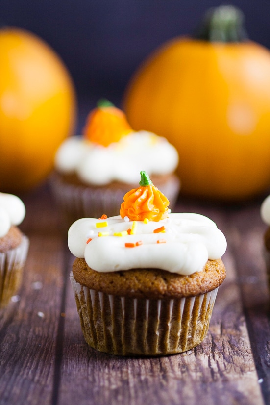 Pumpkin Spice Cupcakes Recipe - These scrumptious and festive Pumpkin Spice Cupcakes topped with cream cheese frosting are an incredibly delicious and flavorful easy dessert recipe for Fall.  Perfect for all pumpkin lovers! This is one of my favorite pumpkin recipes. Make them every fall.