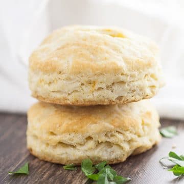 Old Fashioned Buttermilk Biscuits Recipe - Fluffy, flaky Old Fashioned Buttermilk Biscuits recipe is easy to make and is a golden, delicious crowd pleaser! They're so simple and will never disappoint! These flaky, buttery biscuits are perfect for a Thanksgiving side dish or for biscuits and gravy.