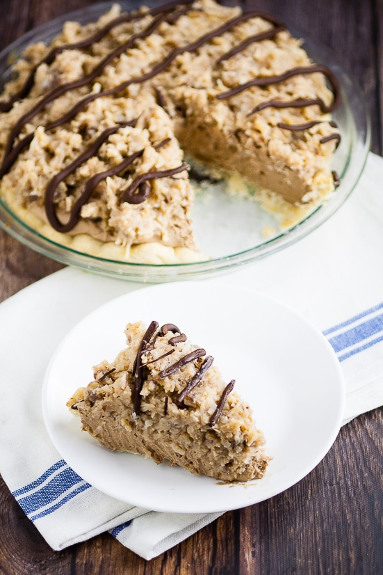 German Chocolate Pie recipe - Silky and creamy, this sweet German Chocolate Pie recipe combines a chocolate cream pie with German sweet chocolate, topped with caramel coconut pecan frosting to make a pie that's to-die-for. Such an easy pie recipe!