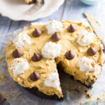 No Bake Pumpkin Chocolate Cheesecake Recipe - Festive, delicious, and easy No Bake Pumpkin Chocolate Cheesecake with a no bake pumpkin spice filling and chocolate chips in a chocolate Oreo crust. Perfect for both pumpkin spice lovers and chocolate lovers! No bake pumpkin spice cheesecake, chocolate chips, and a chocolate oreo crust?! Sounds amazing. Would be an easy Thanksgiving dessert recipe too!