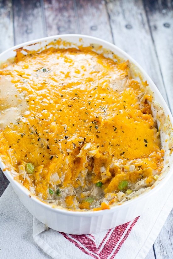 Sweet Potato Turkey Shepherd's Pie recipe with mashed sweet potatoes and turkey and veggies in a creamy gravy. Cozy, sweet and savory, this Sweet Potato Turkey Shepherd's Pie recipe is a great way to use up Thanksgiving leftovers in a warm delightful casserole.