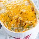 Sweet Potato Turkey Shepherd's Pie recipe with mashed sweet potatoes and turkey and veggies in a creamy gravy. Cozy, sweet and savory, this Sweet Potato Turkey Shepherd's Pie recipe is a great way to use up Thanksgiving leftovers in a warm delightful casserole.