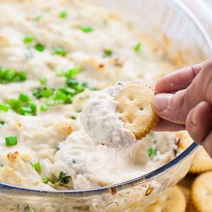 Crab Rangoon Dip Recipe - A simple version that's just like from your favorite Chinese restaurant, this easy Crab Rangoon Dip recipe is packed with flavor with a creamy cream cheese base. Serve with wonton chips or tortilla chips for an easy appetizer recipe!