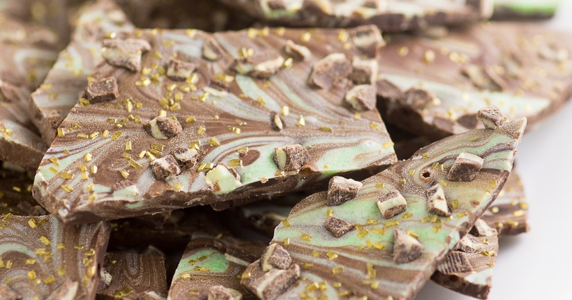 Mint Chocolate Bark Recipe - Easy Mint Chocolate Bark recipe with smooth, rich chocolate swirled with mint flavored white chocolate makes a quick, easy, and decadent dessert. YES! Love mint chocolate. This would be perfect for Christmas or St Patrick's Day.