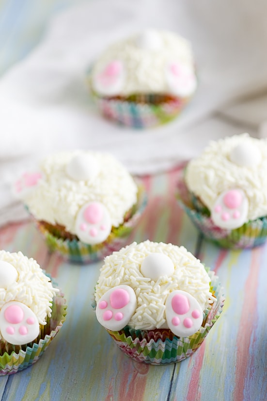 Bunny Butt Cupcakes tutorial - Make these adorable and easy Bunny Butt Cupcakes as a silly Easter treat for kids. Little bunny butts on top of your favorite cupcakes will make the cutest Easter cupcakes around!