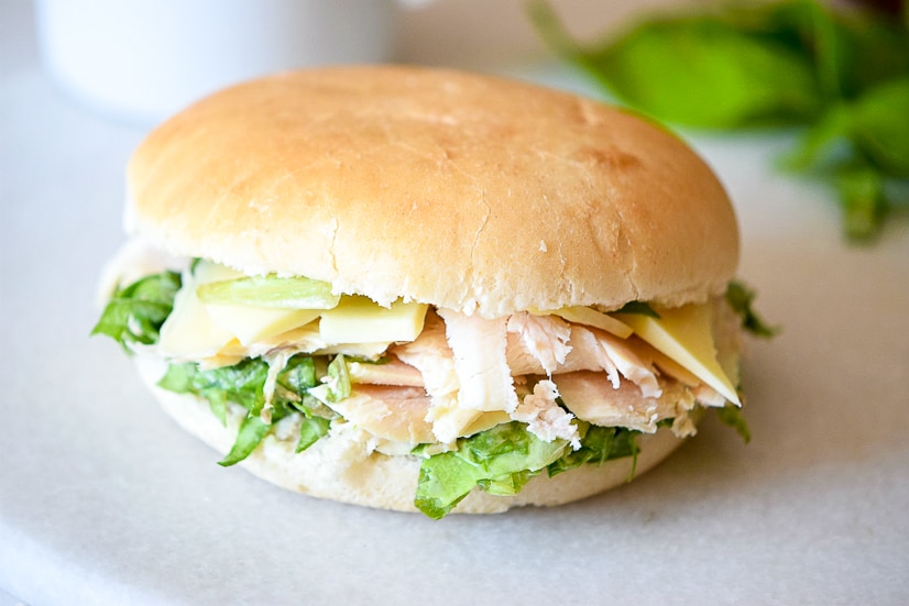 Caesar Salad Sandwiches recipe - Fresh, creamy, and flavorful, these Caesar Salad Sandwiches are a delightful and healthy option for lunch with fresh greens, Parmesan, and chicken. Great for an easy and healthy lunch or an easy dinner recipe without the oven for Summer!