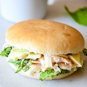 Caesar Salad Sandwiches recipe - Fresh, creamy, and flavorful, these Caesar Salad Sandwiches are a delightful and healthy option for lunch with fresh greens, Parmesan, and chicken. Great for an easy and healthy lunch or an easy dinner recipe without the oven for Summer!