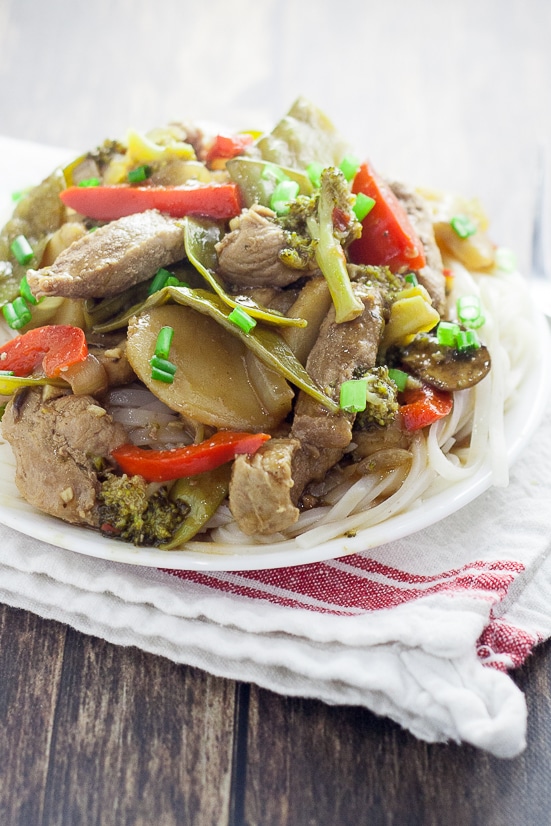Ginger Pork Stir Fry Recipe - Super easy and healthy too, this Ginger Pork Stir Fry recipe is packed with flavor from teriyaki, ginger, garlic, pork, and more, plus all of your favorite veggies. Perfect quick and easy healthy family dinner recipe!