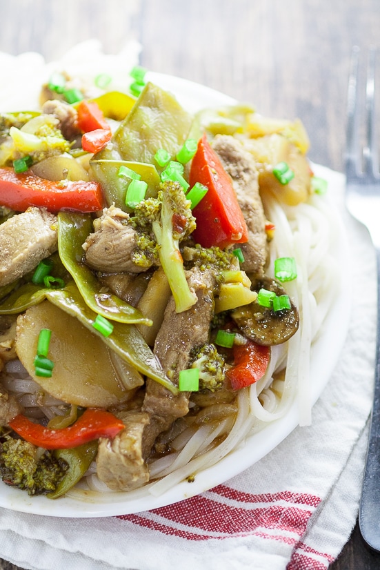 Ginger Pork Stir Fry Recipe - Super easy and healthy too, this Ginger Pork Stir Fry recipe is packed with flavor from teriyaki, ginger, garlic, pork, and more, plus all of your favorite veggies. Perfect quick and easy healthy family dinner recipe!