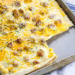 Ham and Cheese Pizza Recipe - Ham and cheese is a classic combination that everyone loves, especially in this creamy, cheesy Ham and Cheese Pizza recipe that makes a yummy and easy family dinner! Make this quick and easy dinner recipe in less than 30 minutes!